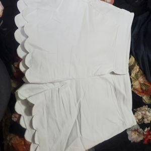 White tulip hem shorts